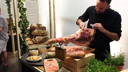 Around the sides of the room, suppliers from the two regions had set up stalls, displaying their products. So, as well as the tapas that was brought out on the trays, we had a whole load of other goodies to try out like this tasty jamón and cheese from Granada.