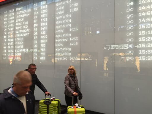 A 40-meter-long, 4.5-meter-high arrivals display functions almost as public art. Arrivals are indicated on white LED panels behind an existing glass wall covered in translucent white vinyl.