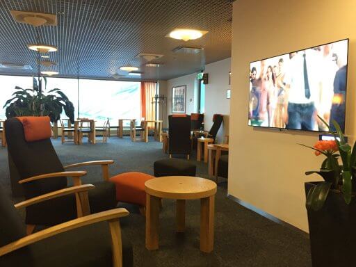 Watch TV and relax in the armchairs in the Tallinn Airport Business Lounge
